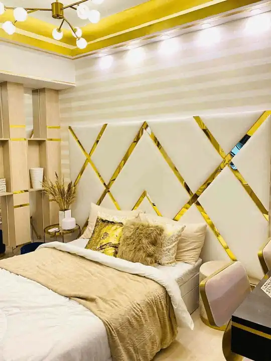 Luxurious bedroom with gold accents